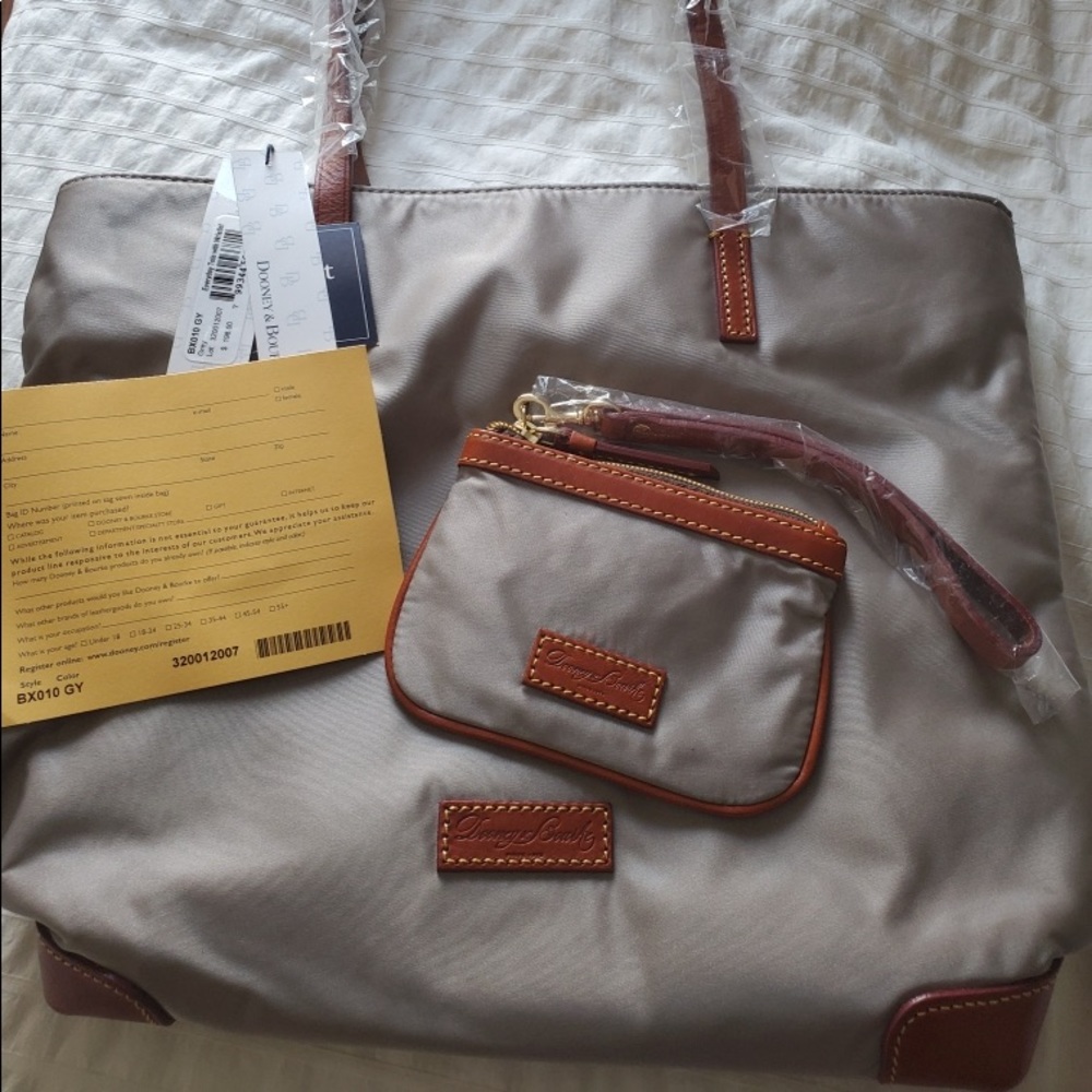 Dooney and bourke hand bag and  wristlet
